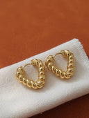 Prudence 18k non-tarnish twisted heart hoop earrings by DIEZYONCE