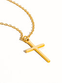 Triza 18k non-tarnish small cross necklace by DIEZYONCE